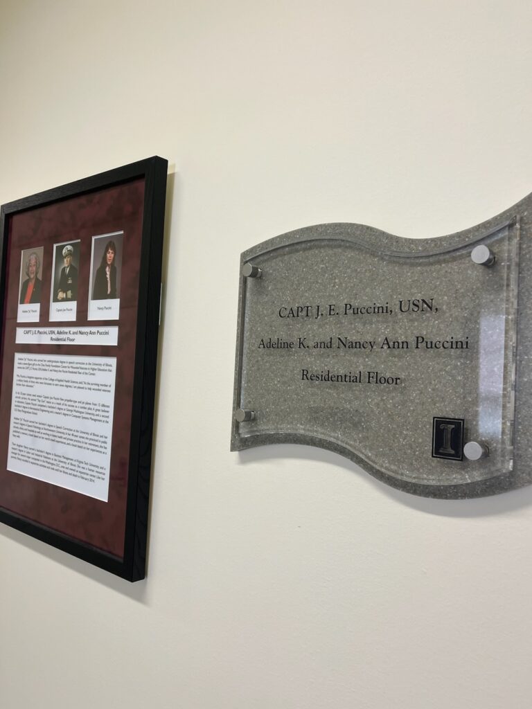 placard for Capt. J.E. Puccini, USN naming the residential floor at the Chez Veterans Center from donors Adeline K. and Nancy Ann Puccini